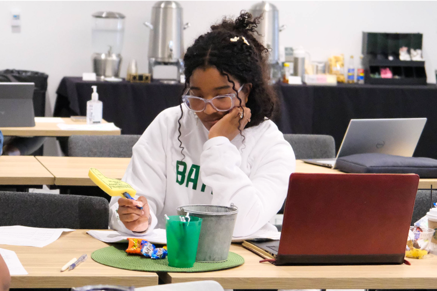 Student reading while at Immersion for the E.D.D. in Learning & Org Change  program.